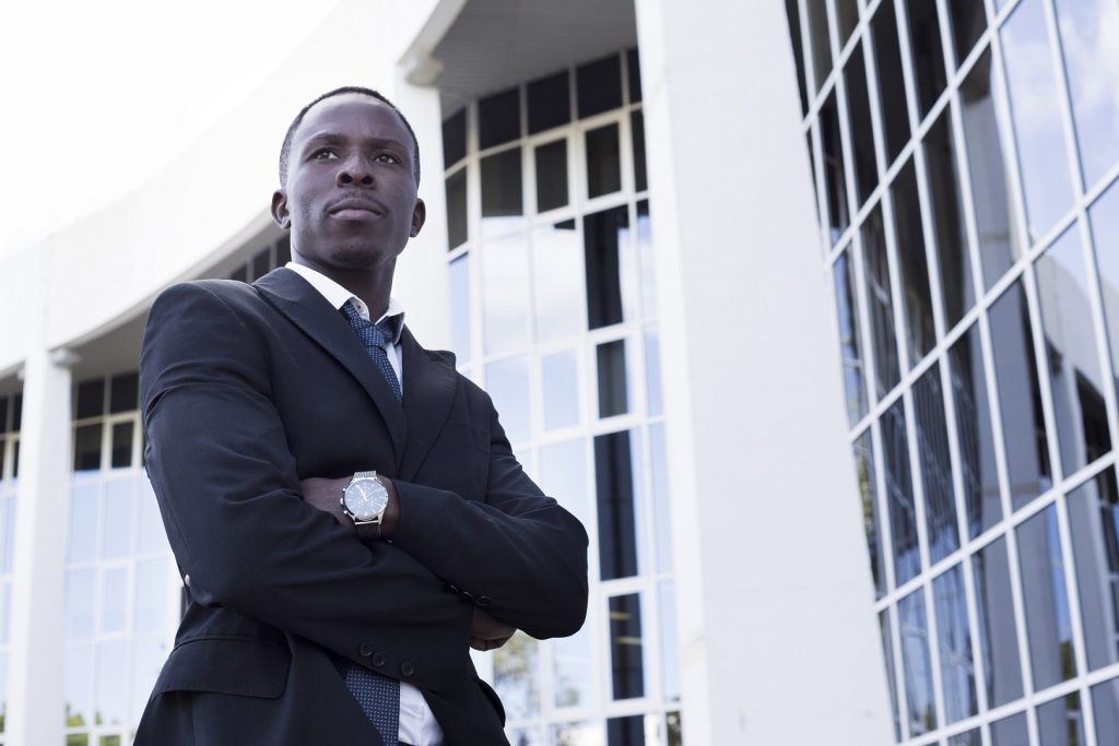 elegant businessman with arms crossed